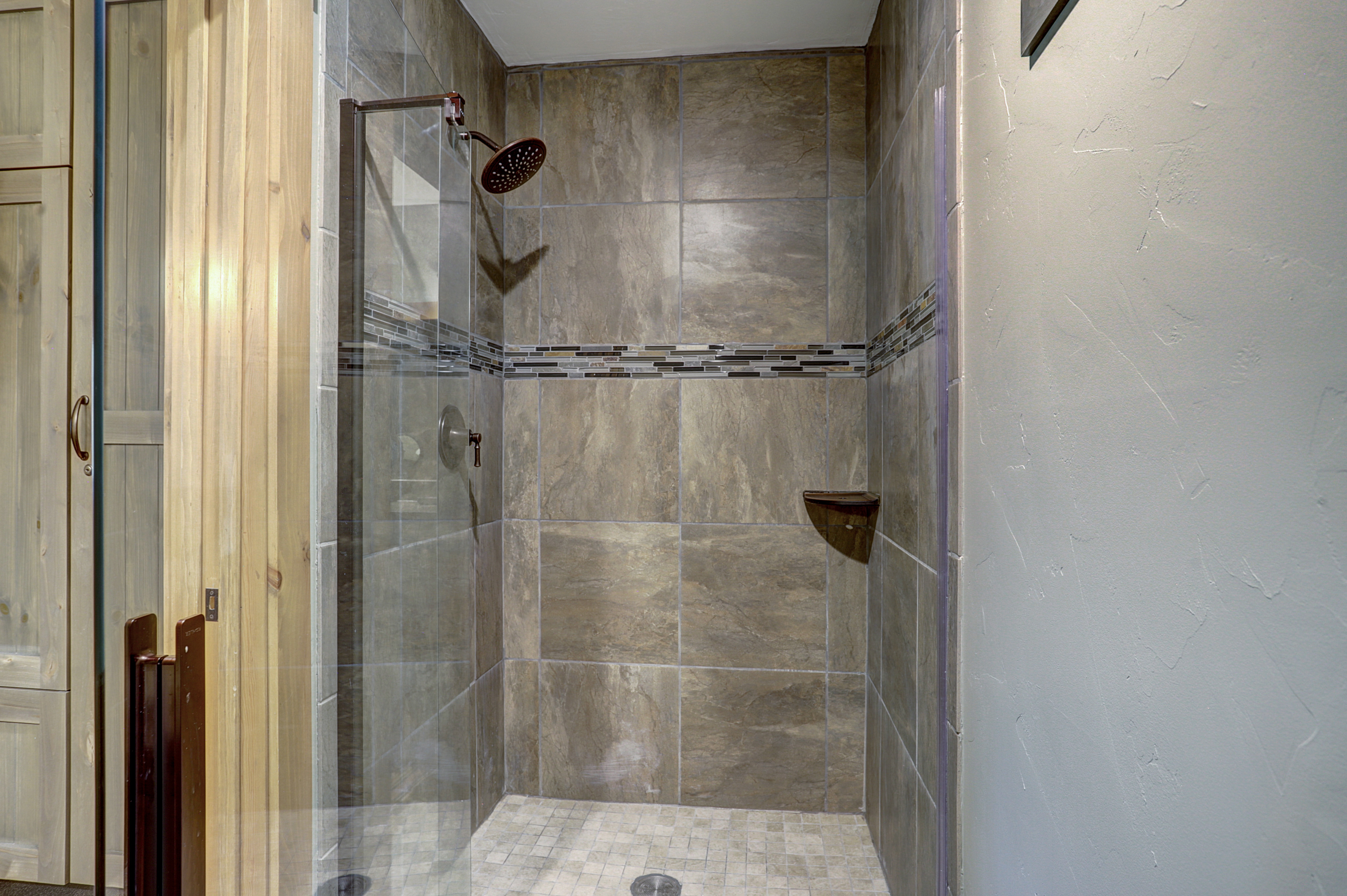Walk-in shower in private bath in master