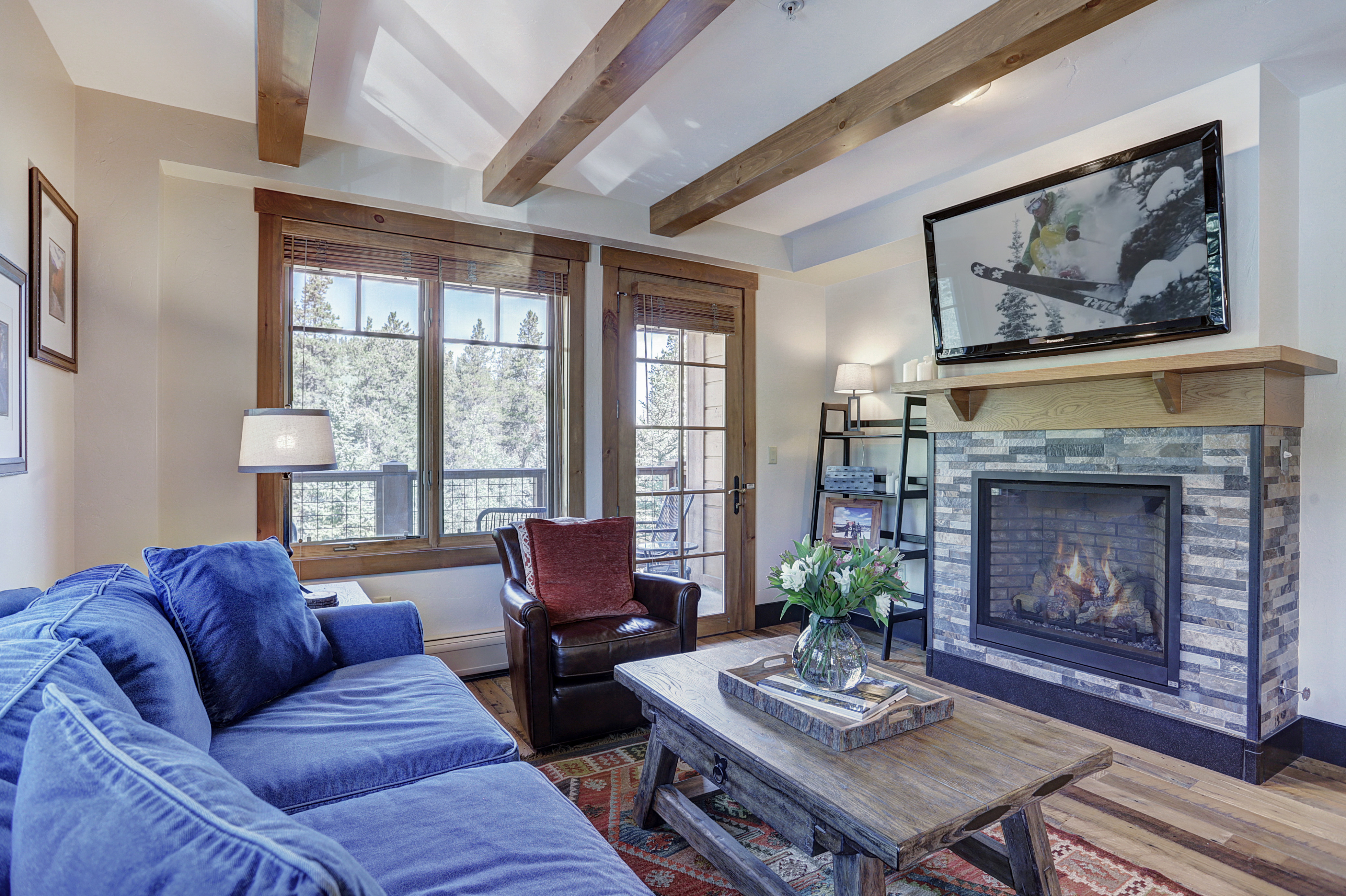 Warm by the gas fireplace and snuggle in to watch a movie or show