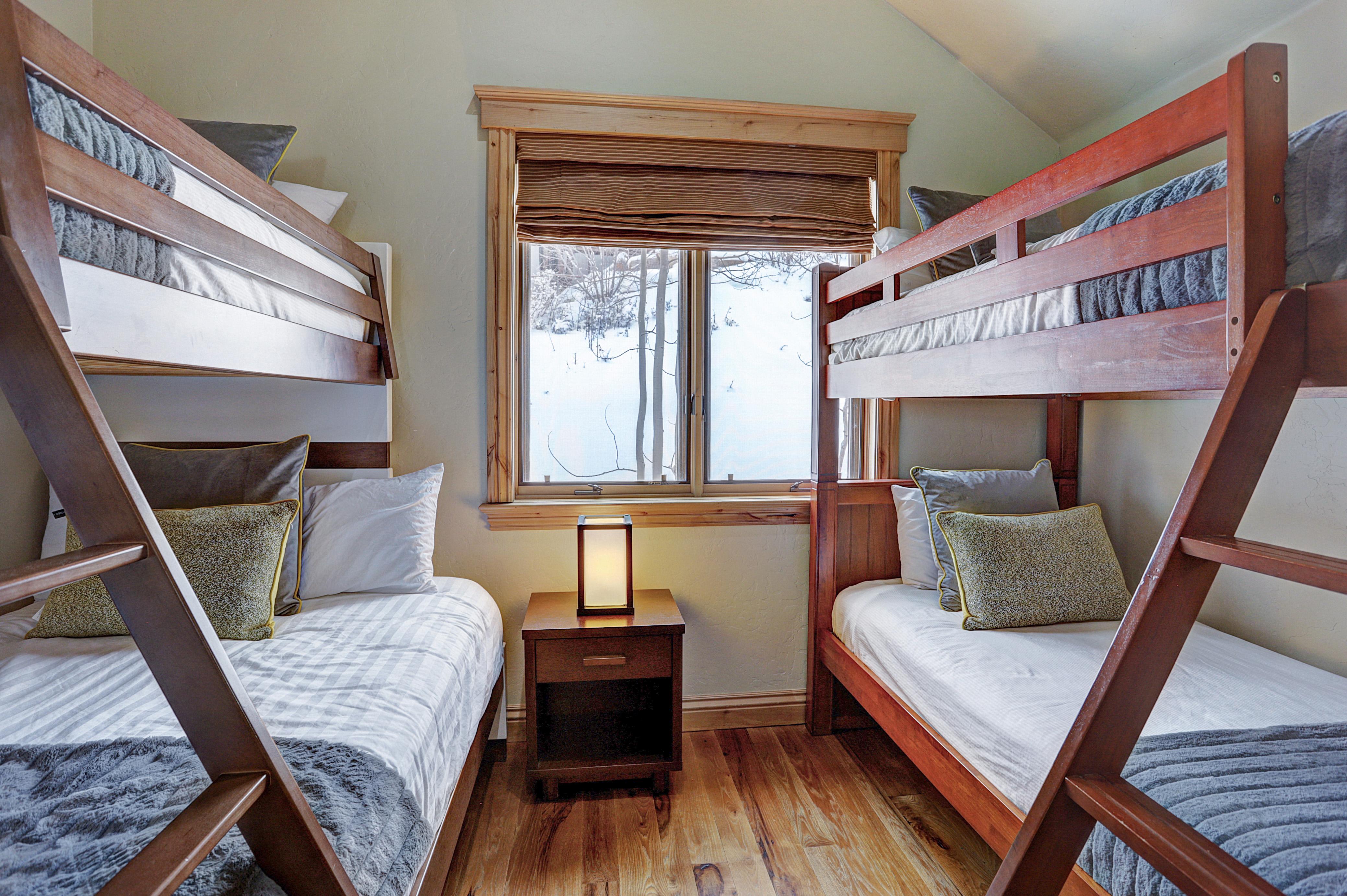 Additional view of upper level bunk room with private bath