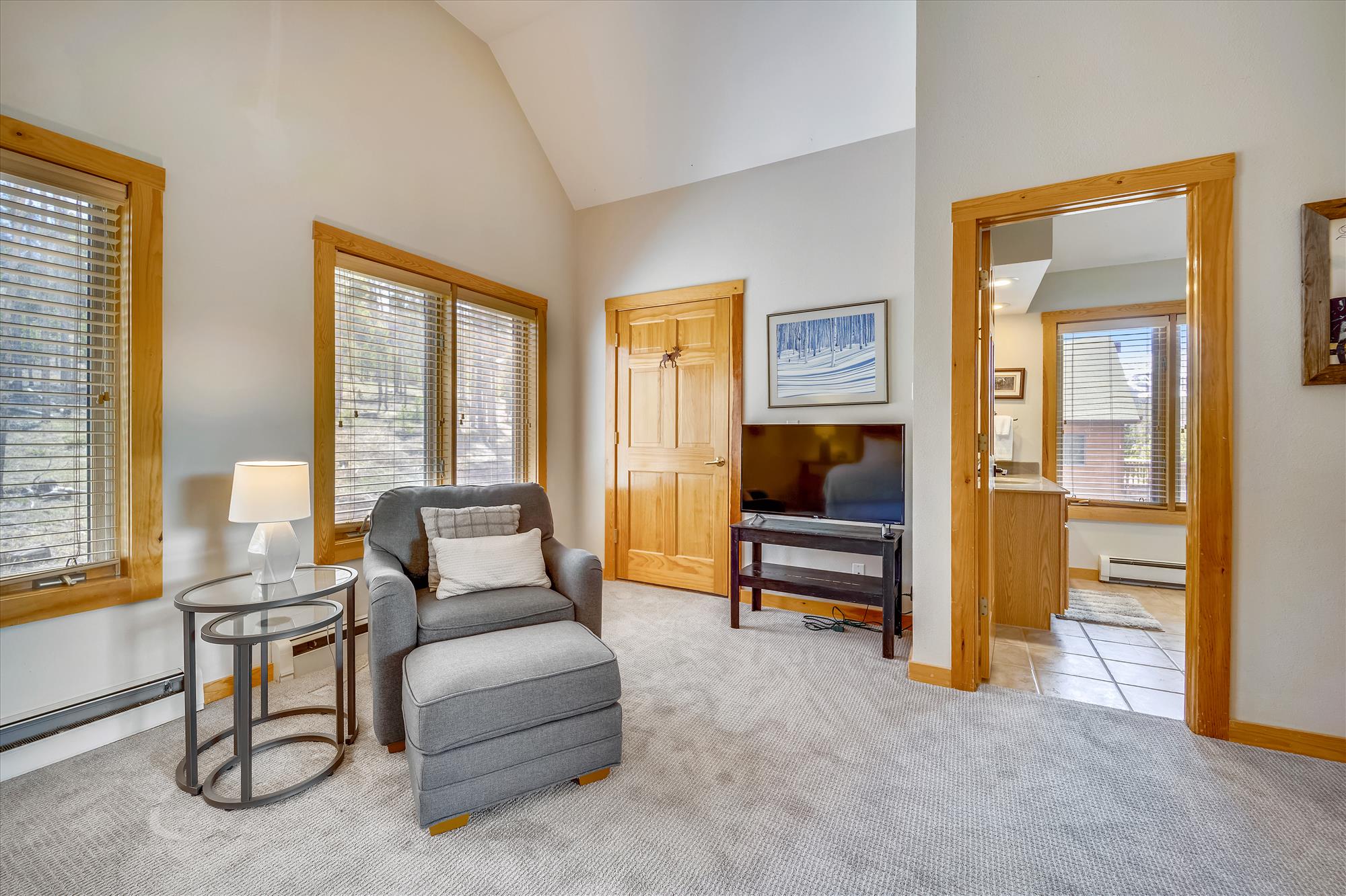 Master King Bedroom television and seating - Powder Moose Villa - Breckenridge Vacation Rental