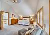 Master King Bedroom with reading chair - Powder Moose Villa - Breckenridge Vacation Rental