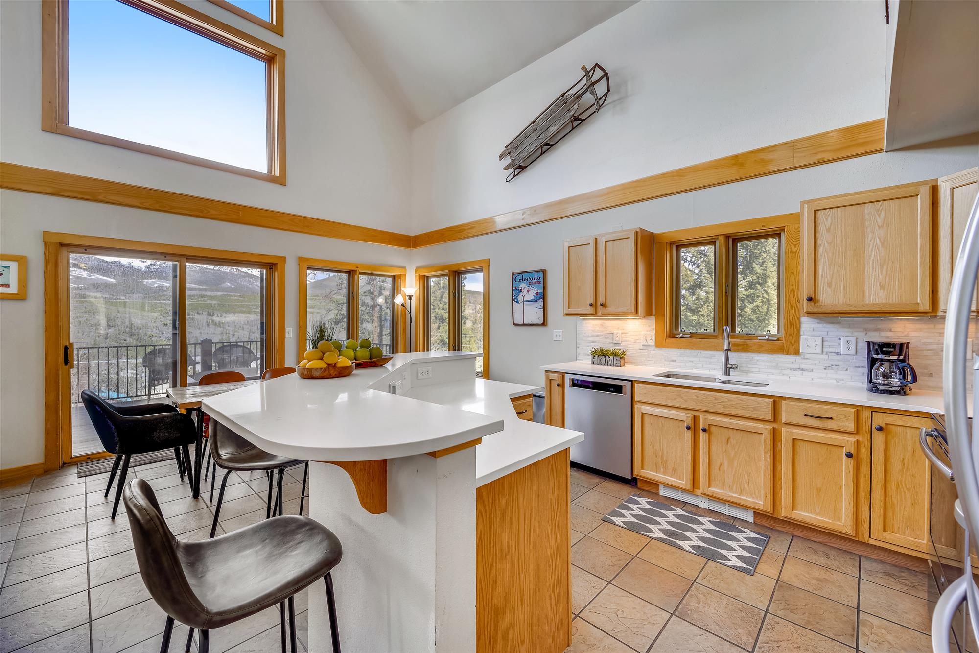 Kitchen with bar area - Powder Moose Villa - Breckenridge Vacation Rental