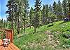 This home has many outdoor decks and seating areas to enjoy the mountain air. 