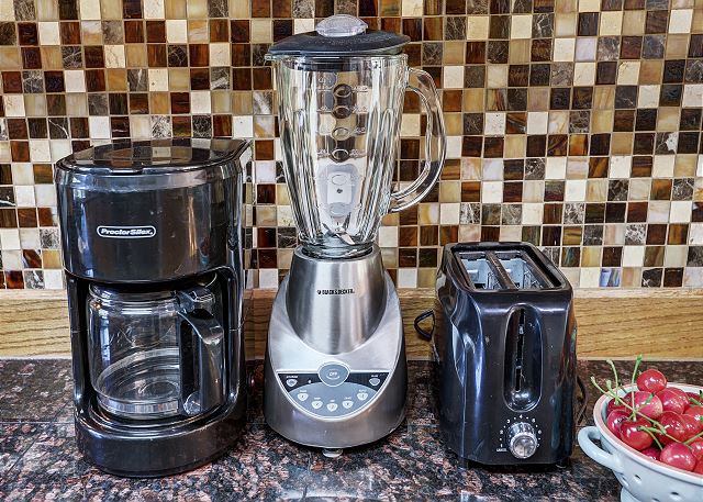 12 cup coffee maker, blender, toaster and slow cooker provided in the kitchen.