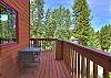 This home has many outdoor decks and seating areas to enjoy the mountain air. 