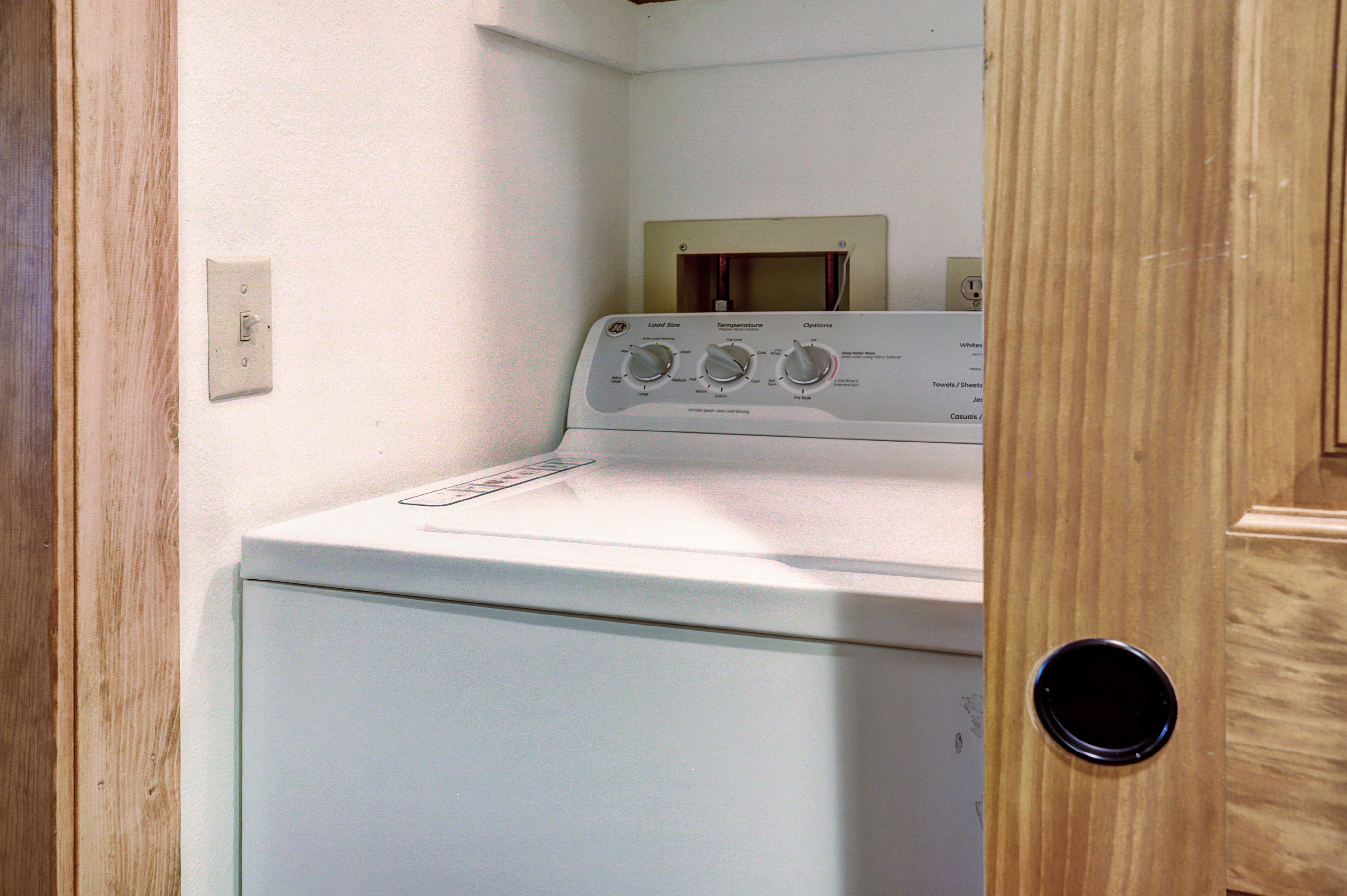 Full size washer and dryer in lower level closet.
