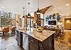 Gourmet kitchen with access to the dining and living areas, Snow Mansion, Breckenridge Vacation Rental