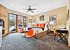 Main bedroom with a fireplace and desk, Snow Mansion, Breckenridge Vacation Rental