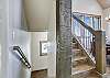 Stairway to upper and lower levels - Highwood Hideaway Breckenridge Vacation Rental