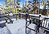 Main level deck with sun chairs and table set - Highwood Hideaway Breckenridge Vacation Rental