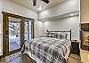 Lower level master bedroom with private door to the patio - Highwood Hideaway Breckenridge Vacation Rental