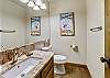 Half bath located on main floor - Highwood Hideaway Breckenridge Vacation Rental