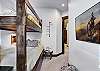 Additional view of lower level bunkroom with shared bathroom -Breckenridge Vacation Rental