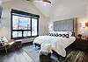 Main level master bedroom with King-size bed and private bathroom- Breckenridge Vacation Rental