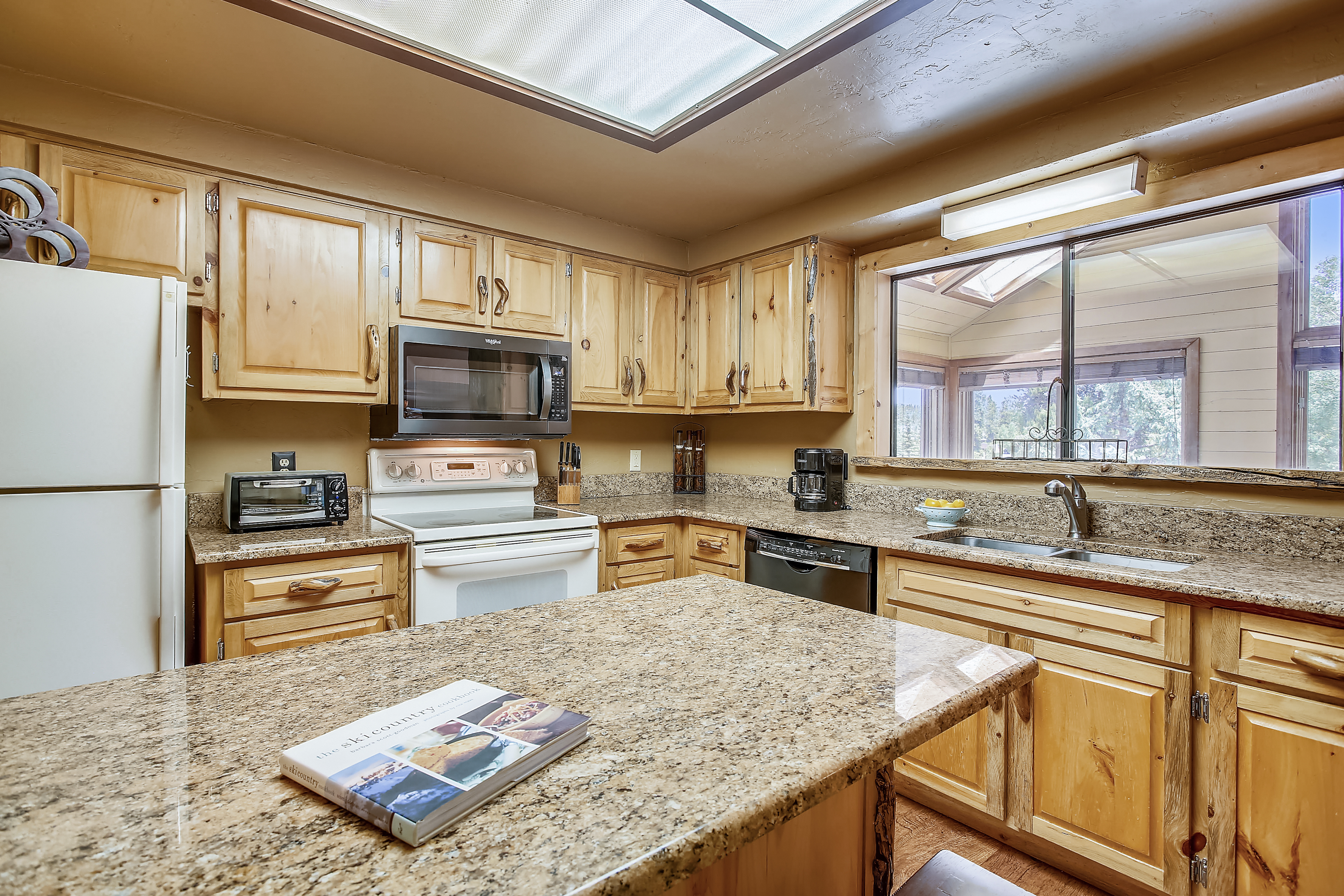 Have a wonderful meal in this open kitchen - Cedars 53 Breckenridge Vacation Rental