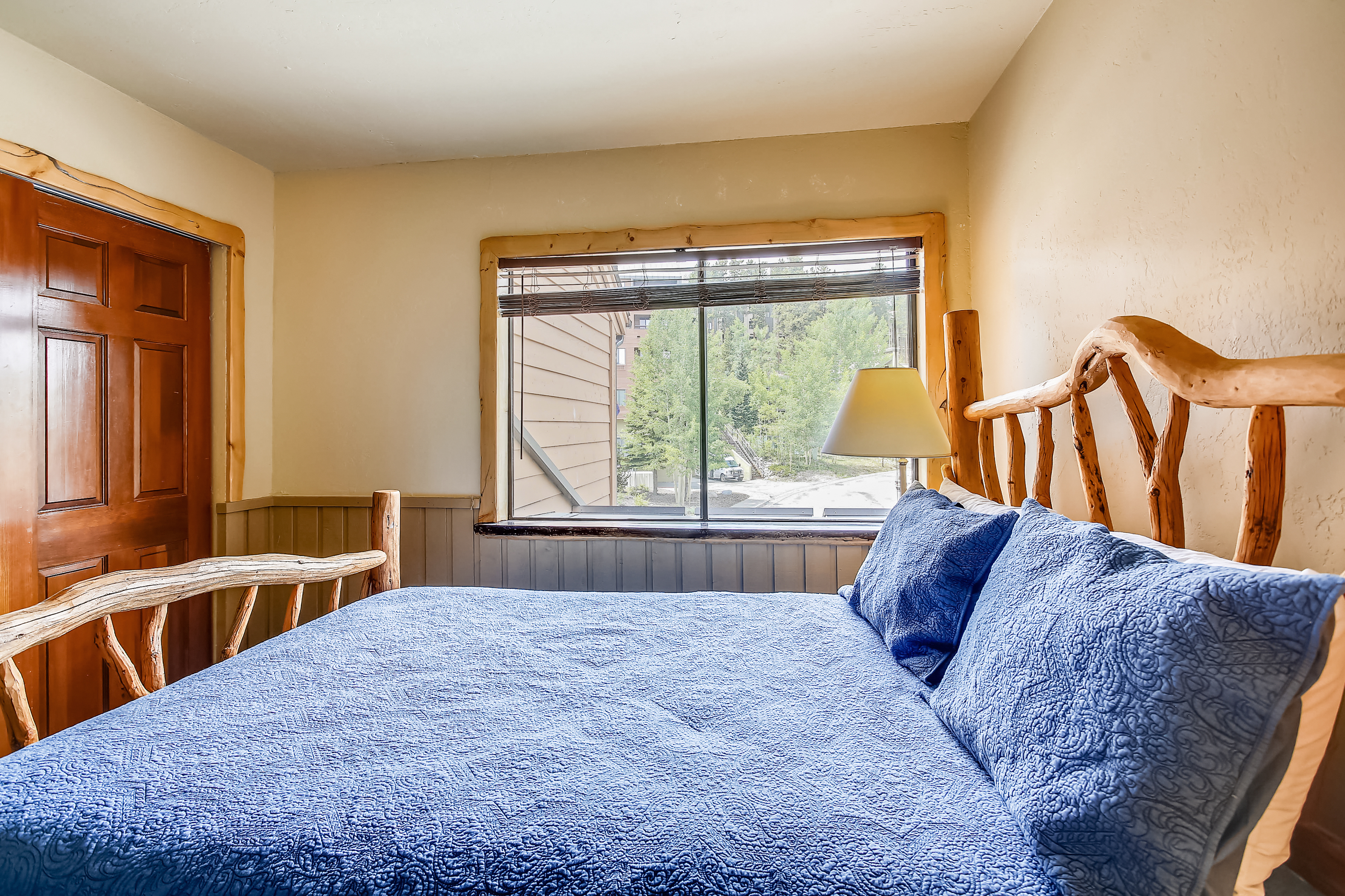 Enjoy a relaxing night in this cozy queen bedroom - Cedars 53 Breckenridge Vacation Rental