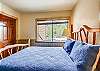 Enjoy a relaxing night in this cozy queen bedroom - Cedars 53 Breckenridge Vacation Rental