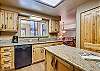 Kitchen view overlooking the dining room - Cedars 53 Breckenridge Vacation Rental