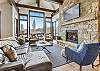 Take in the beautiful views while relaxing and watching TV or sitting by the fireplace - Barton Creek Vista Breckenridge Vacation Rental 