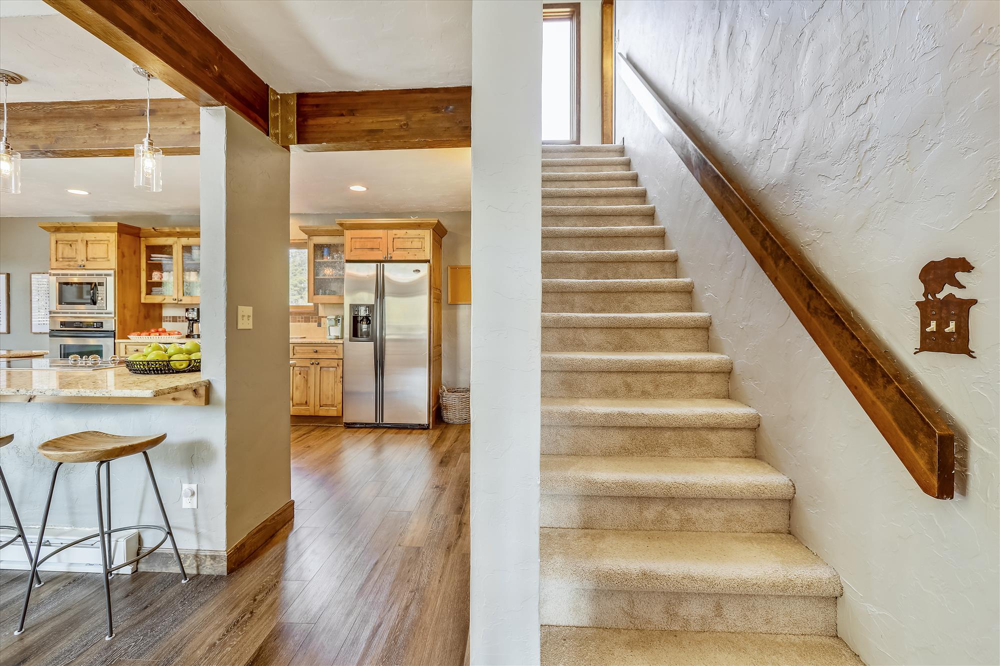 Stairway to top level with two bedrooms - Calderon De La Breck Breckenridge Vacation Rental