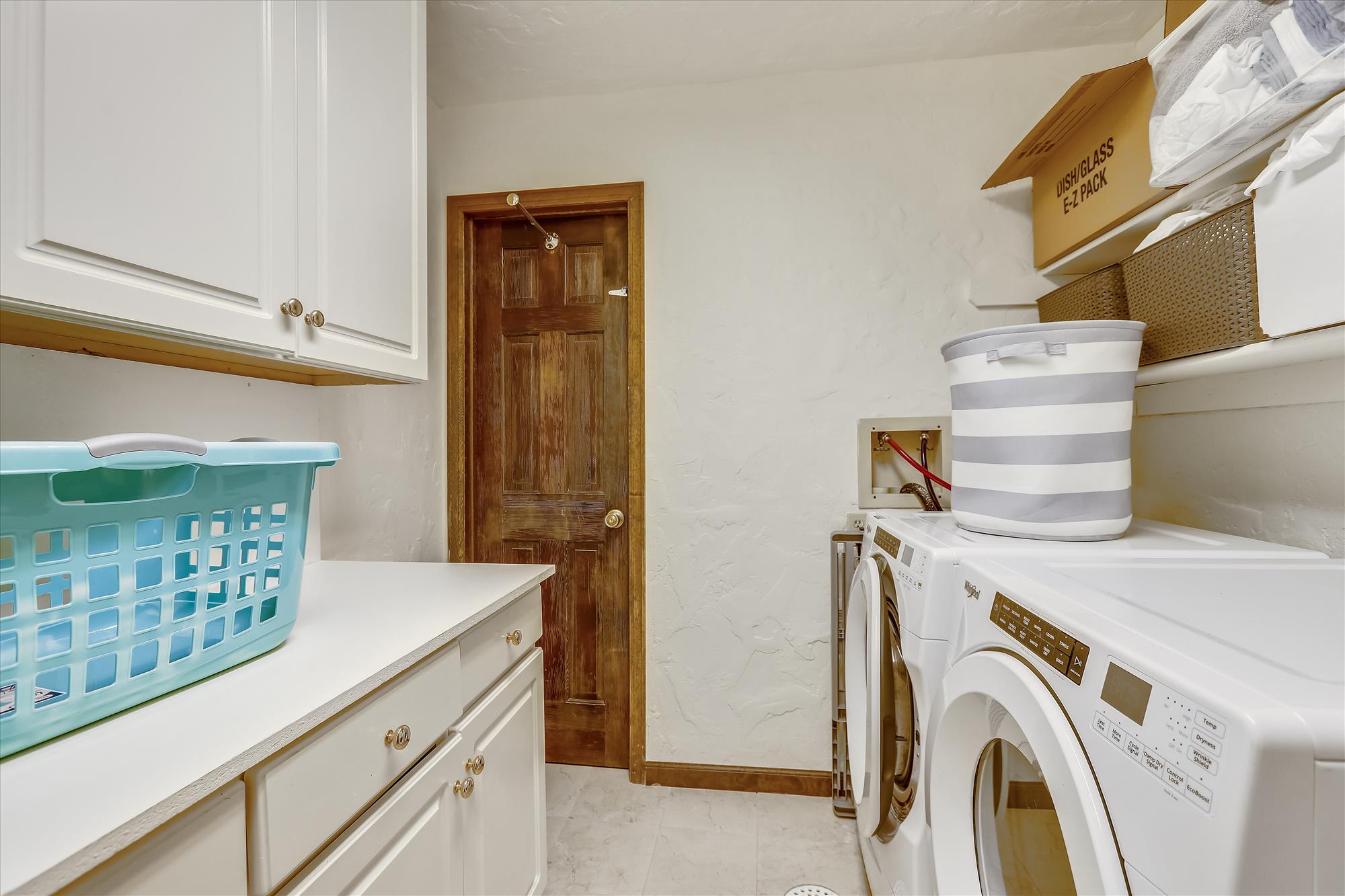 Laundry room located on the bottom floor with full size washer and dryer - Calderon De La Breck Breckenridge Vacation Rental
