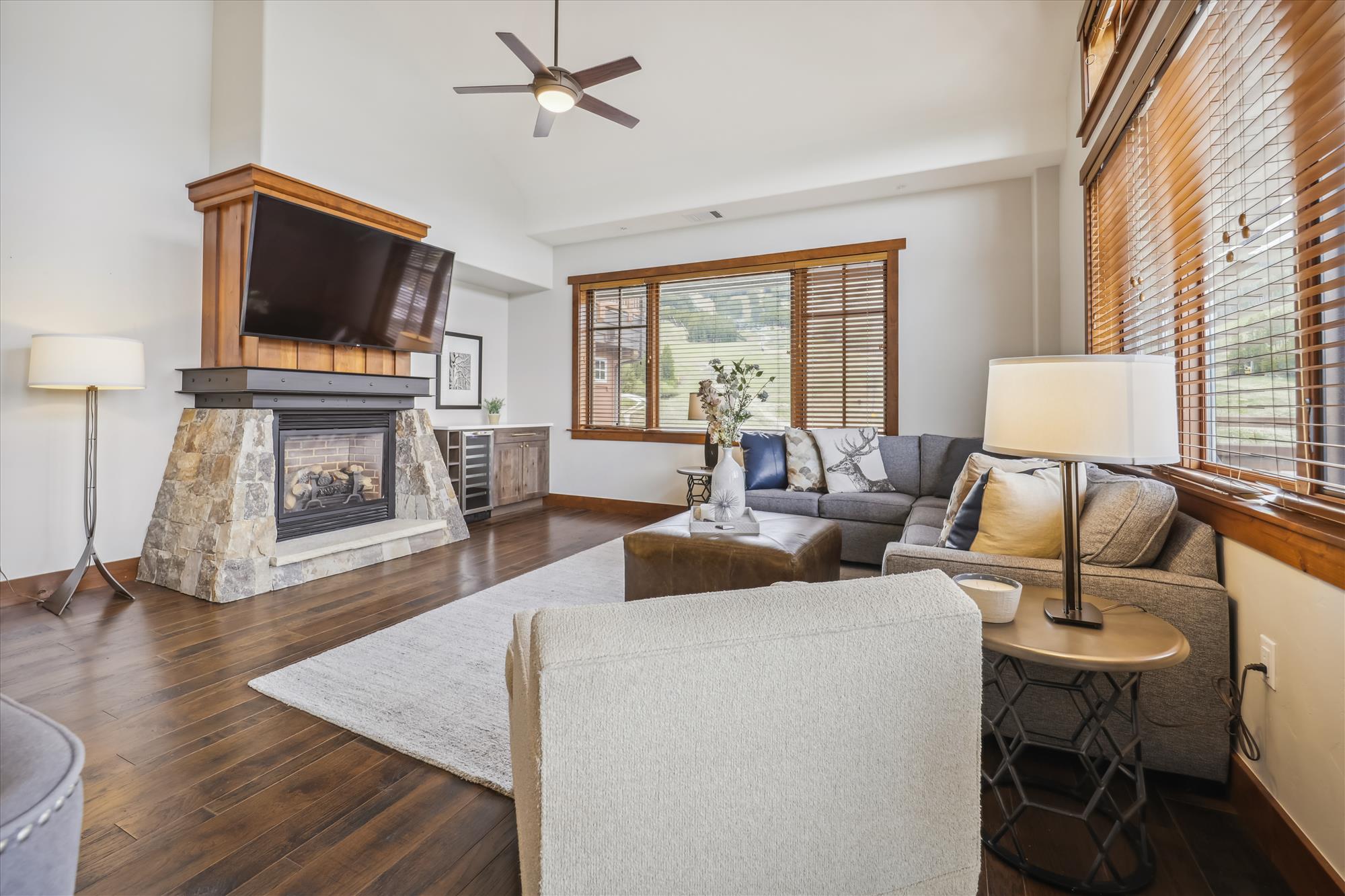 Living area with large flat screen TV & fireplace -One Ski Hill Place 8424-Breckenridge Vacation Rental