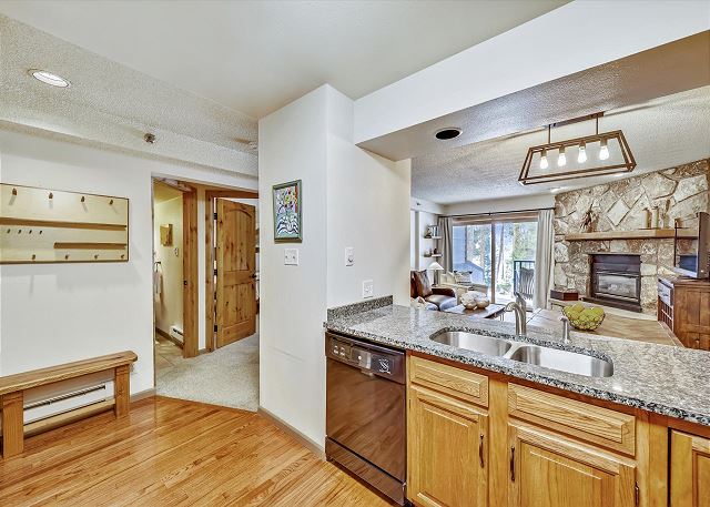 Don't miss out on anything in this open concept kitchen and living area - Atrium 003 Breckenridge Vacation Rental