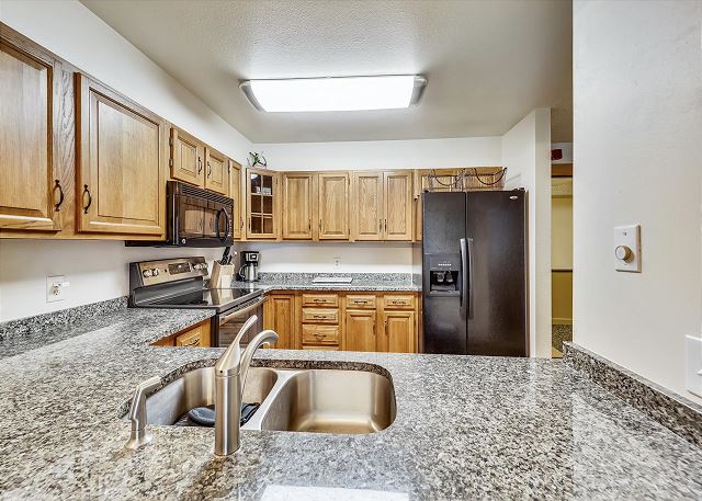 Updated appliances and granite countertops - Atrium 003 Breckenridge Vacation Rental