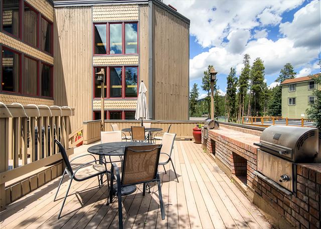 Have a bbq on the communal deck with the guest grills - Atrium 003 Breckenridge Vacation Rental