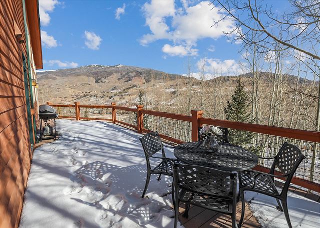 Deck with seating and grill - Chateau D'Amis Silverthorne Vacation Rental