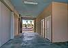 The parking is under the condo and has room for 2 covered spaces.  Additional parking in front.  Access the elevator from carport.