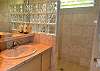 Second Bathroom with walk in tiled shower.