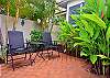 Bistro seating in West lanai, adjacent to outdoor shower.