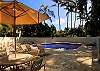 Kahala Pool with tables, umbrellas, and lounge chairs
