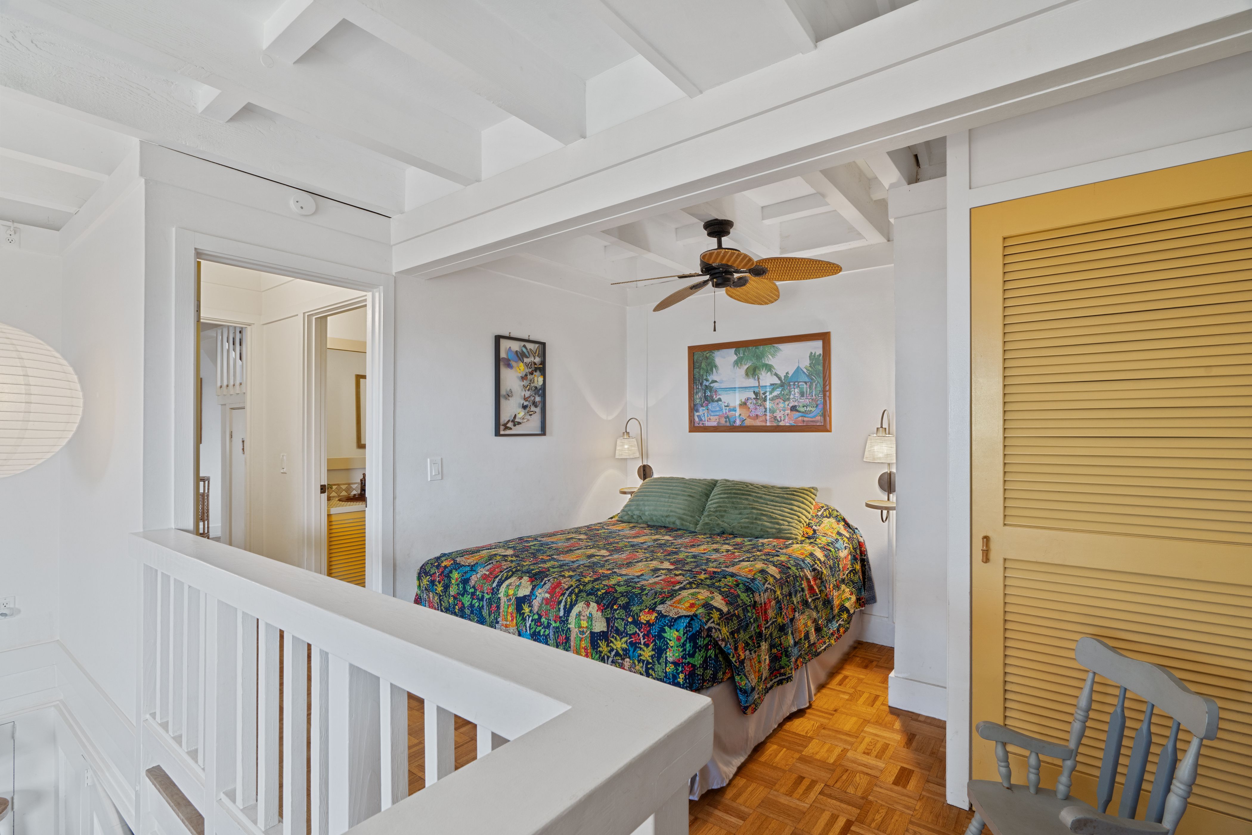 Amazing Views Hale queen bed in main level double-bedroom bonus den. Can be closed from the main house to convert to private suite. Opens directly to the pool and hot tub lanai.