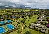 Kahala condo units facing north, birds eye view of grounds, walkway and tennis courts.