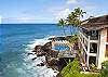 Outstanding view of the most scenic pool in Poipu with swaying palms in the background.