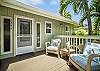Enjoy a cup of coffee on the cozy lanai