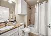 Hallway full bath. Shower/tub combo 