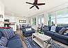 A lot of comfortable seating in living room 