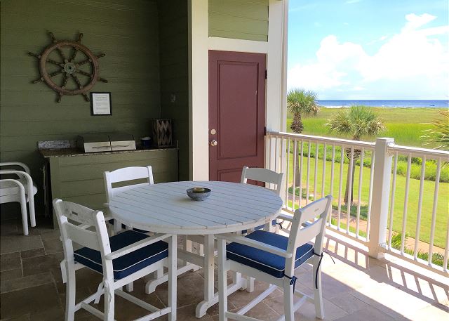 Outdoor dining area with private grill.
~ Pointe West Vacation ~