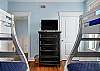 3rd guest bedroom has two sets of bunk beds - both twin over full. High def LED TV