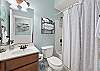 Hallway bathroom with shower/tub combo