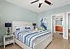 Master bedroom with a king bed ~ Hosted by Pointe West Vacation ~