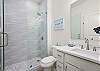 Hall bathroom with walk-in shower 