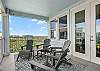 Spacious balcony with comfortable loungers 