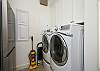Laundry room has 2nd full size refrigerator & state of the art washer & dryer.