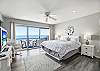 Secluded upstairs bedroom with a king bed, ocean views and smart tv.