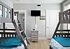 3rd bedroom has two bunk beds - both twin over full. Also has LED smart TV.