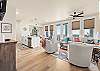 Open floor plan with windows facing the gulf